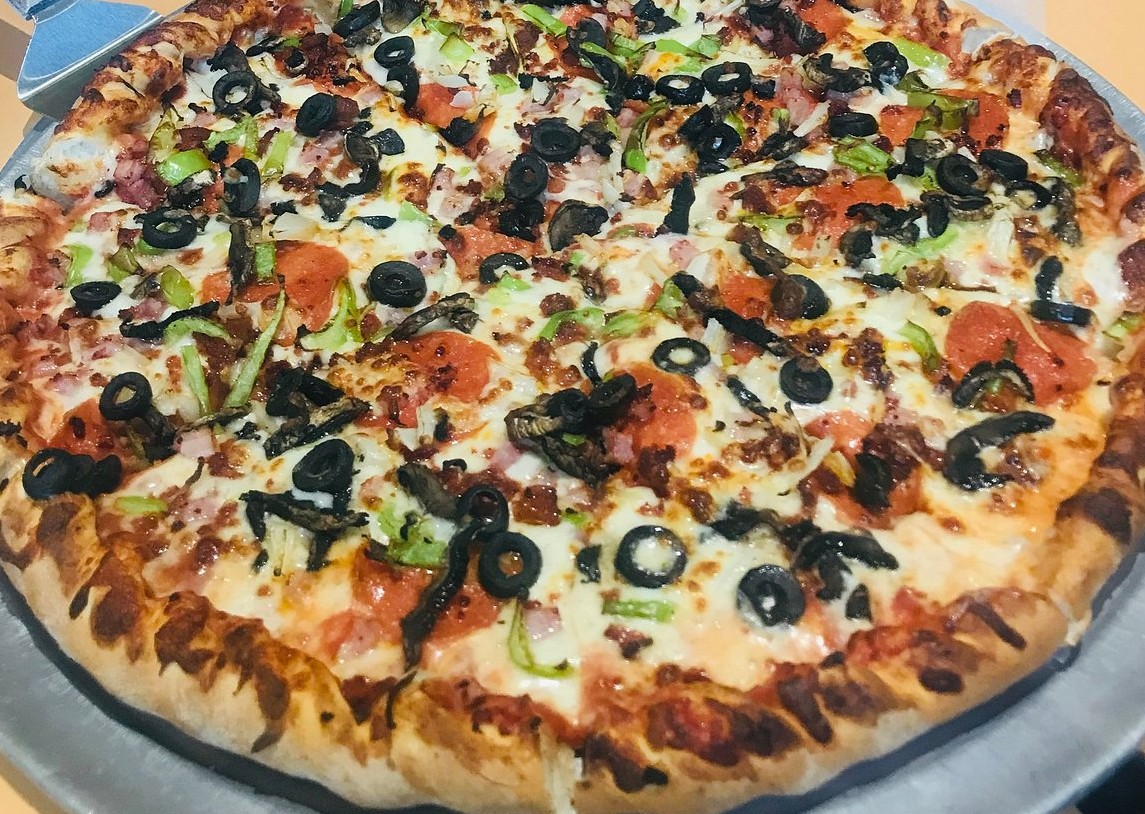 Heathers Pizza Culebra Island Flamenco Beach Pepperoni Olives Cheese